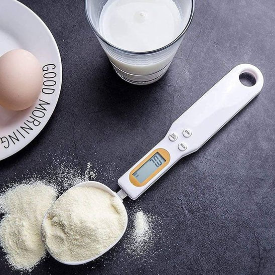 Cuillère doseuse​ digitale avec poudre de lait