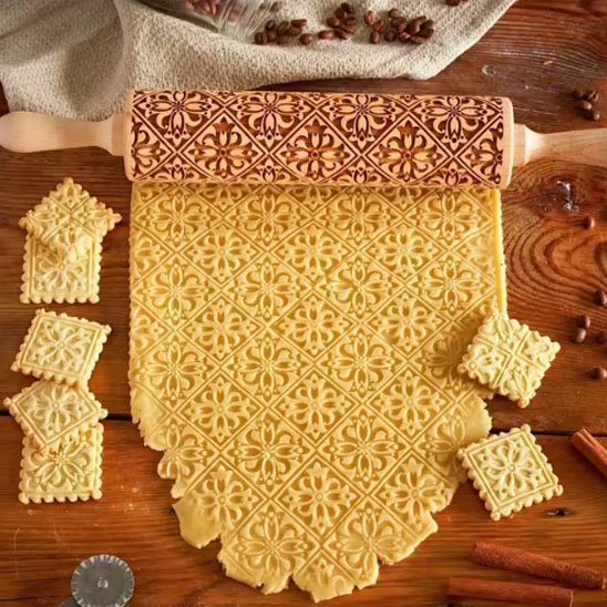 rouleau à pâtisserie gravé de motifs décoratifs, utilisé pour étaler de la pâte à biscuits avec des formes décorées